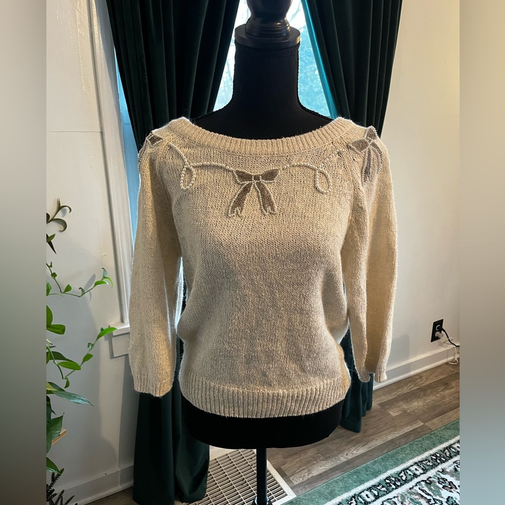Elegant Cream Sweater with Bow Detail